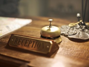 reception-desk-with-antique-hotel-bell-3771110